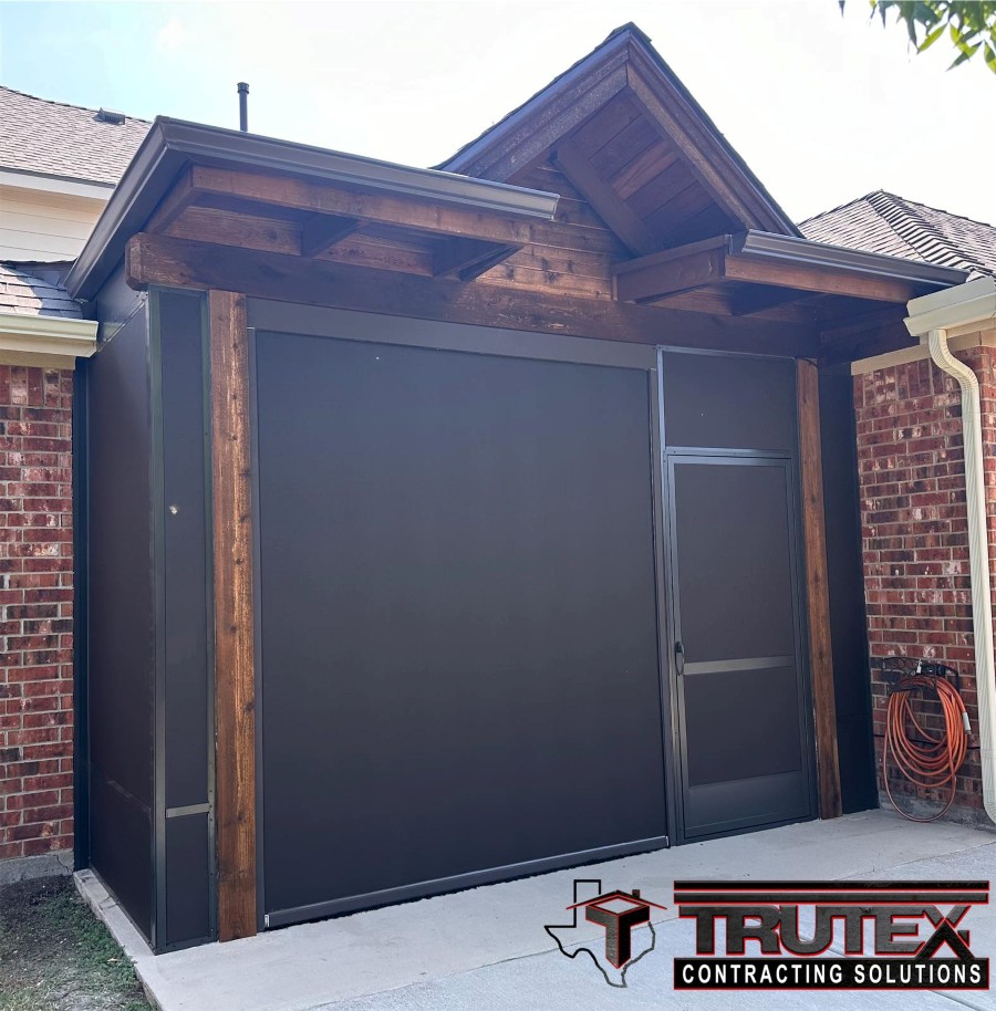 New garage installed on wooden style home by Trutex
